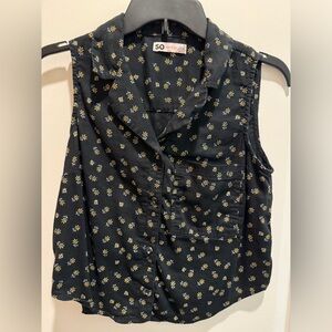 Black button up top with yellow flowers